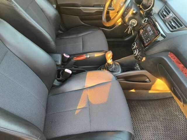 Білий Кіа Ріо, об'ємом двигуна 1.4 л та пробігом 160 тис. км за 8500 $, фото 12 на Automoto.ua