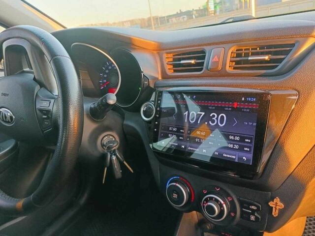 Білий Кіа Ріо, об'ємом двигуна 1.4 л та пробігом 160 тис. км за 8500 $, фото 13 на Automoto.ua