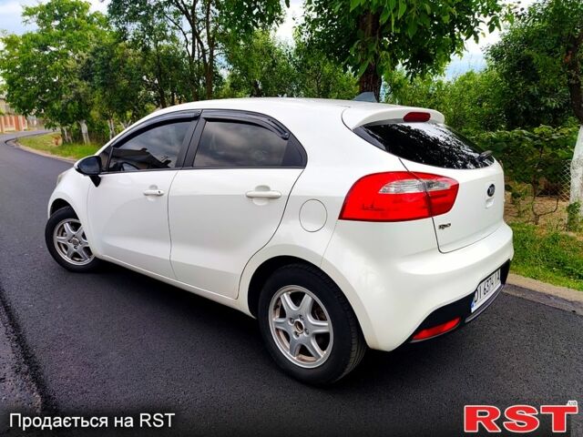 Белый Киа Рио, объемом двигателя 1.4 л и пробегом 282 тыс. км за 6999 $, фото 2 на Automoto.ua