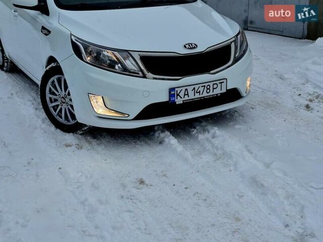 Білий Кіа Ріо, об'ємом двигуна 1.4 л та пробігом 132 тис. км за 8800 $, фото 76 на Automoto.ua