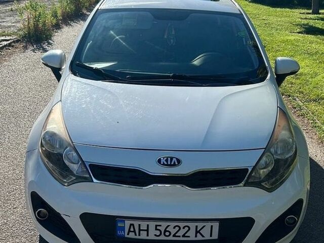 Білий Кіа Ріо, об'ємом двигуна 1.6 л та пробігом 100 тис. км за 8500 $, фото 13 на Automoto.ua
