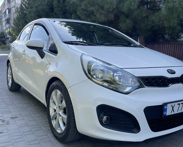Белый Киа Рио, объемом двигателя 1.3 л и пробегом 127 тыс. км за 6999 $, фото 1 на Automoto.ua