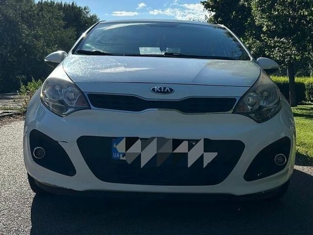 Білий Кіа Ріо, об'ємом двигуна 1.6 л та пробігом 100 тис. км за 8500 $, фото 2 на Automoto.ua
