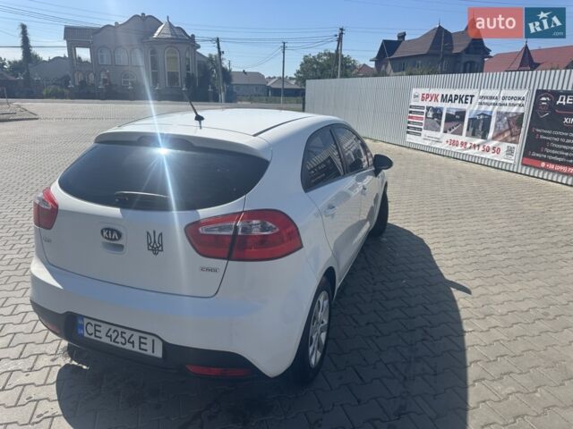 Білий Кіа Ріо, об'ємом двигуна 1.12 л та пробігом 289 тис. км за 5800 $, фото 1 на Automoto.ua