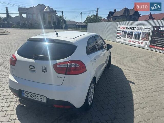 Белый Киа Рио, объемом двигателя 1.12 л и пробегом 289 тыс. км за 5800 $, фото 1 на Automoto.ua