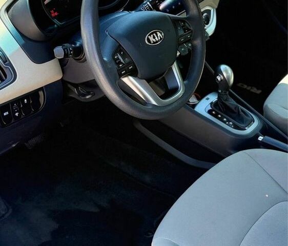 Білий Кіа Ріо, об'ємом двигуна 1.6 л та пробігом 101 тис. км за 8500 $, фото 11 на Automoto.ua