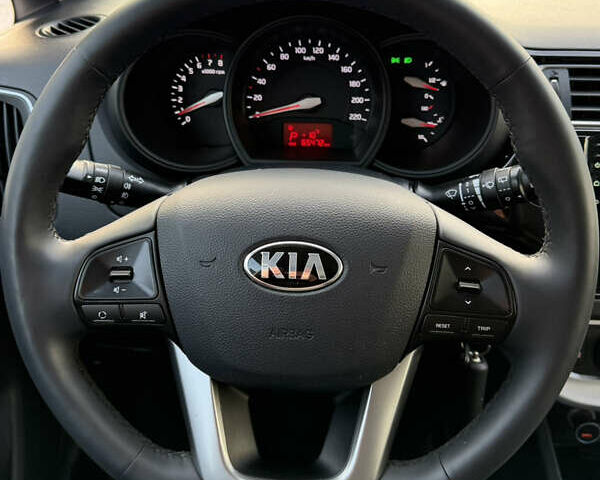 Білий Кіа Ріо, об'ємом двигуна 1.4 л та пробігом 65 тис. км за 12700 $, фото 35 на Automoto.ua