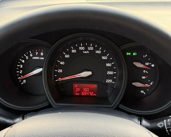 Білий Кіа Ріо, об'ємом двигуна 1.4 л та пробігом 65 тис. км за 12700 $, фото 38 на Automoto.ua