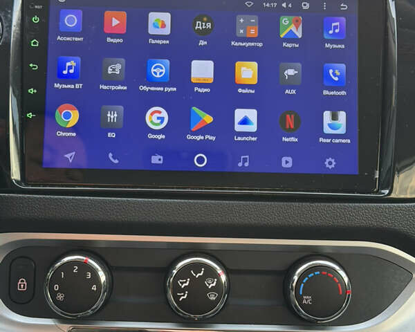 Білий Кіа Ріо, об'ємом двигуна 1.4 л та пробігом 65 тис. км за 12700 $, фото 34 на Automoto.ua