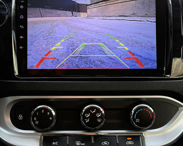 Білий Кіа Ріо, об'ємом двигуна 1.4 л та пробігом 65 тис. км за 12700 $, фото 29 на Automoto.ua