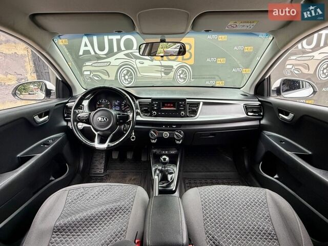 Білий Кіа Ріо, об'ємом двигуна 1.25 л та пробігом 69 тис. км за 9900 $, фото 11 на Automoto.ua