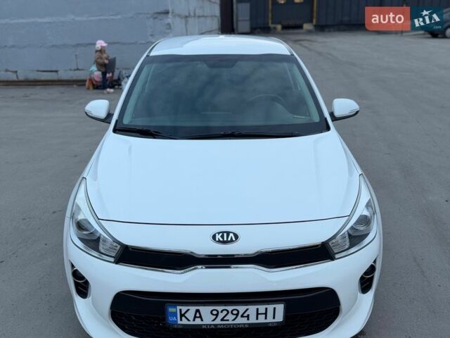 Білий Кіа Ріо, об'ємом двигуна 1.4 л та пробігом 89 тис. км за 13400 $, фото 14 на Automoto.ua