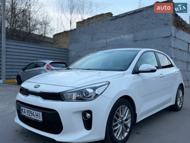 Білий Кіа Ріо, об'ємом двигуна 1.4 л та пробігом 89 тис. км за 13400 $, фото 12 на Automoto.ua
