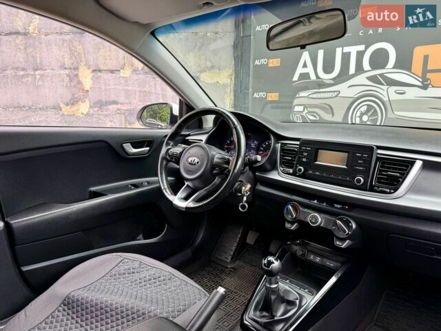 Білий Кіа Ріо, об'ємом двигуна 1.25 л та пробігом 69 тис. км за 9900 $, фото 10 на Automoto.ua