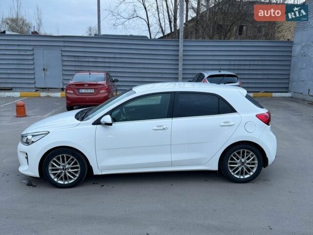 Білий Кіа Ріо, об'ємом двигуна 1.4 л та пробігом 89 тис. км за 13400 $, фото 9 на Automoto.ua