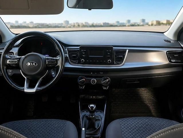 Білий Кіа Ріо, об'ємом двигуна 1.25 л та пробігом 69 тис. км за 9900 $, фото 3 на Automoto.ua