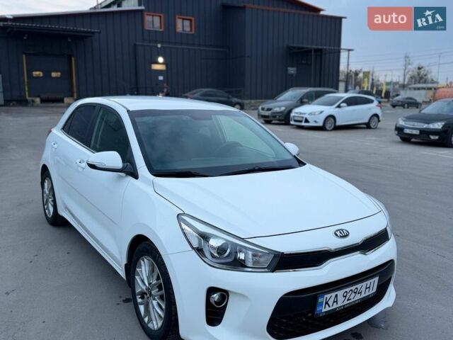 Білий Кіа Ріо, об'ємом двигуна 1.4 л та пробігом 89 тис. км за 13400 $, фото 16 на Automoto.ua
