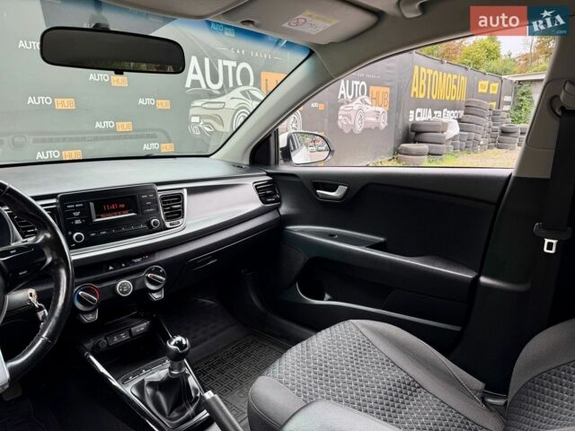 Білий Кіа Ріо, об'ємом двигуна 1.25 л та пробігом 69 тис. км за 9900 $, фото 9 на Automoto.ua