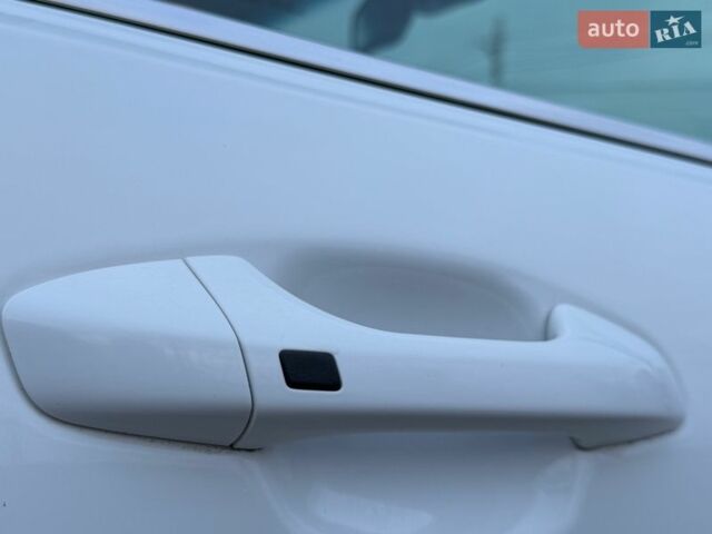 Білий Кіа Ріо, об'ємом двигуна 1.4 л та пробігом 89 тис. км за 13400 $, фото 37 на Automoto.ua