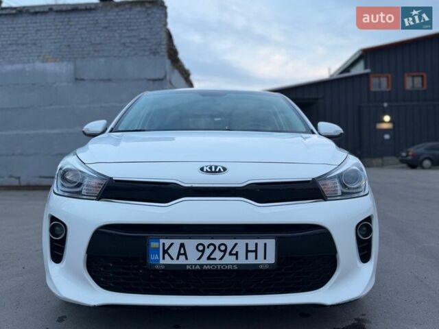 Білий Кіа Ріо, об'ємом двигуна 1.4 л та пробігом 89 тис. км за 13400 $, фото 15 на Automoto.ua
