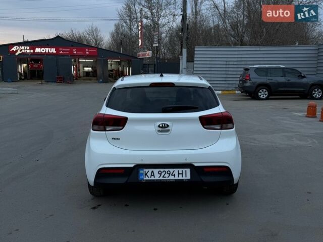Білий Кіа Ріо, об'ємом двигуна 1.4 л та пробігом 89 тис. км за 13400 $, фото 2 на Automoto.ua