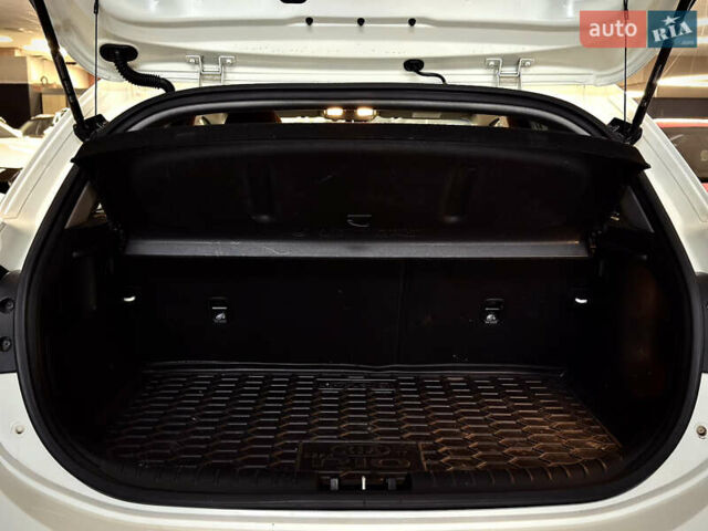 Білий Кіа Ріо, об'ємом двигуна 1.4 л та пробігом 65 тис. км за 12499 $, фото 12 на Automoto.ua