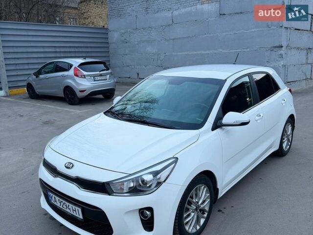 Білий Кіа Ріо, об'ємом двигуна 1.4 л та пробігом 89 тис. км за 13400 $, фото 11 на Automoto.ua