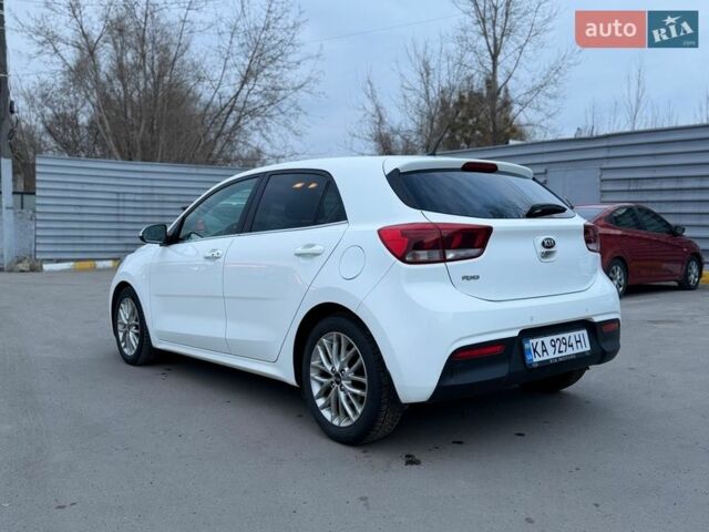Білий Кіа Ріо, об'ємом двигуна 1.4 л та пробігом 89 тис. км за 13400 $, фото 7 на Automoto.ua