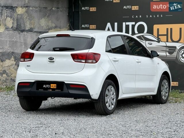 Білий Кіа Ріо, об'ємом двигуна 1.25 л та пробігом 69 тис. км за 9900 $, фото 5 на Automoto.ua