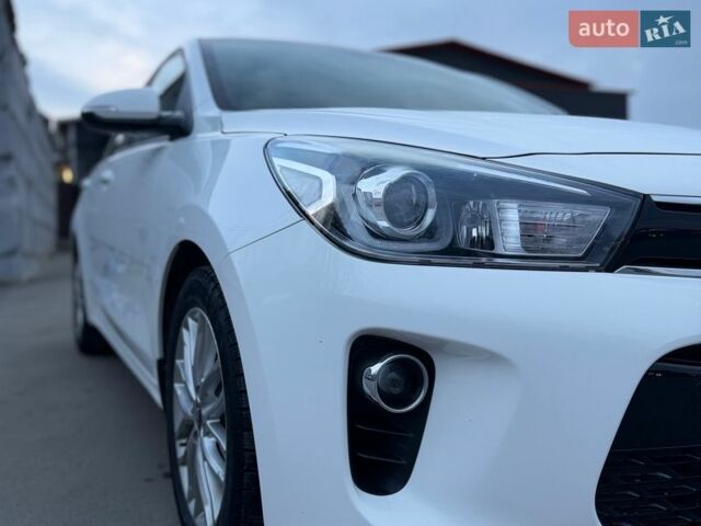 Білий Кіа Ріо, об'ємом двигуна 1.4 л та пробігом 89 тис. км за 13400 $, фото 17 на Automoto.ua
