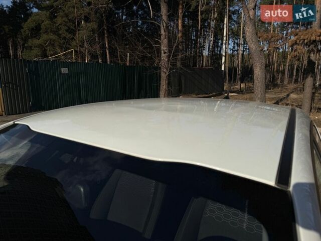 Белый Киа Рио, объемом двигателя 1.4 л и пробегом 138 тыс. км за 12000 $, фото 3 на Automoto.ua