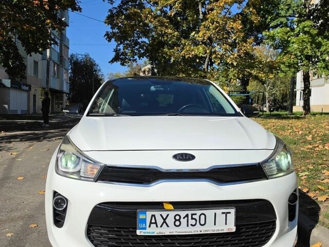Білий Кіа Ріо, об'ємом двигуна 1.37 л та пробігом 105 тис. км за 13000 $, фото 4 на Automoto.ua