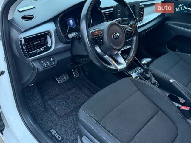Білий Кіа Ріо, об'ємом двигуна 1.4 л та пробігом 89 тис. км за 13400 $, фото 21 на Automoto.ua