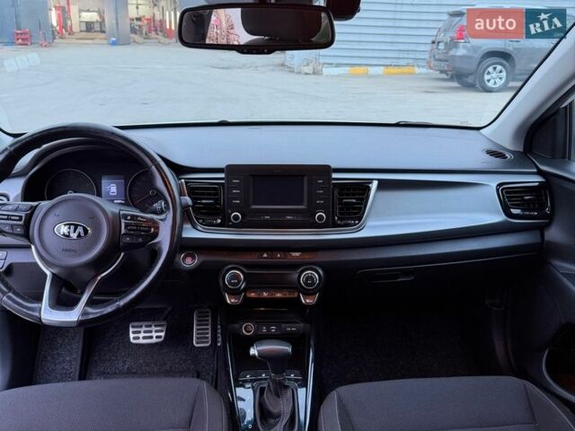 Білий Кіа Ріо, об'ємом двигуна 1.4 л та пробігом 89 тис. км за 13400 $, фото 23 на Automoto.ua