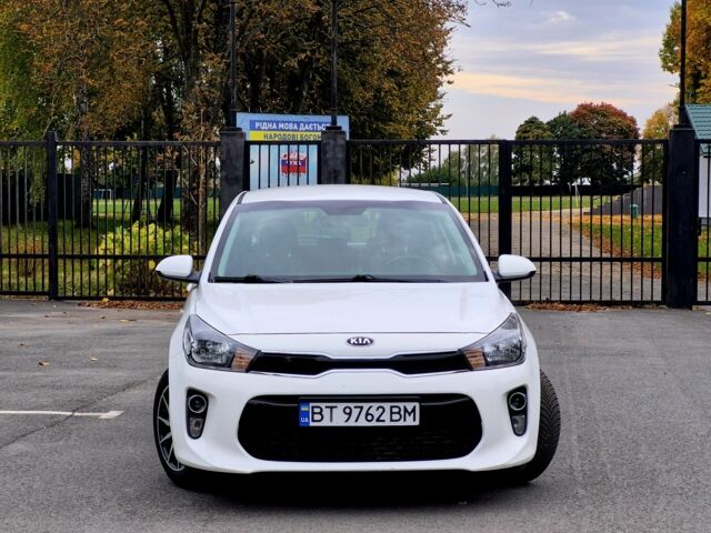 Білий Кіа Ріо, об'ємом двигуна 1.2 л та пробігом 91 тис. км за 8424 $, фото 1 на Automoto.ua