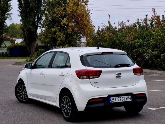 Білий Кіа Ріо, об'ємом двигуна 1.2 л та пробігом 91 тис. км за 8424 $, фото 3 на Automoto.ua