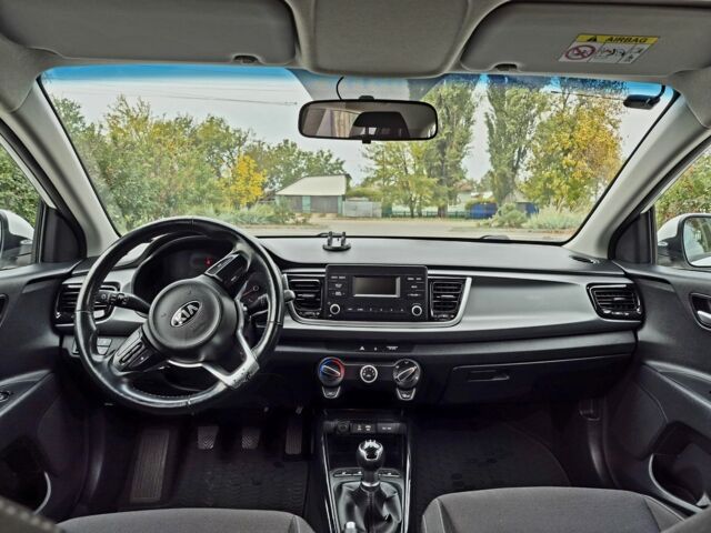 Білий Кіа Ріо, об'ємом двигуна 1.2 л та пробігом 91 тис. км за 8424 $, фото 10 на Automoto.ua