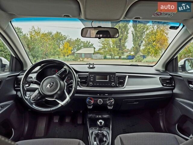 Білий Кіа Ріо, об'ємом двигуна 1.25 л та пробігом 91 тис. км за 8500 $, фото 8 на Automoto.ua