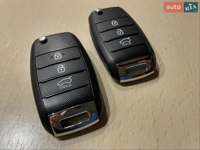 Белый Киа Рио, объемом двигателя 1.25 л и пробегом 46 тыс. км за 10000 $, фото 64 на Automoto.ua