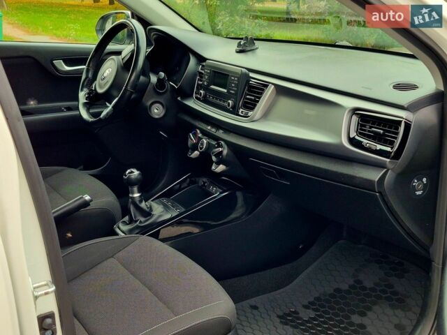 Білий Кіа Ріо, об'ємом двигуна 1.25 л та пробігом 91 тис. км за 8500 $, фото 6 на Automoto.ua