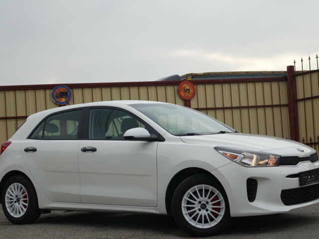 Білий Кіа Ріо, об'ємом двигуна 1.6 л та пробігом 29 тис. км за 12499 $, фото 5 на Automoto.ua