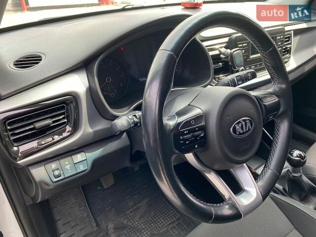 Білий Кіа Ріо, об'ємом двигуна 1.25 л та пробігом 72 тис. км за 11300 $, фото 30 на Automoto.ua