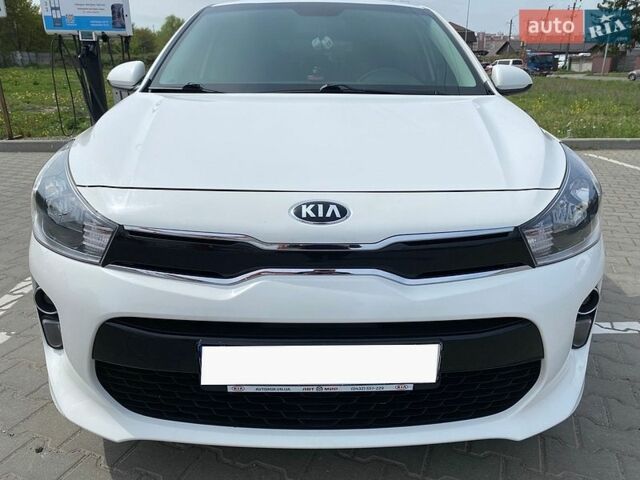 Білий Кіа Ріо, об'ємом двигуна 1.25 л та пробігом 72 тис. км за 11300 $, фото 8 на Automoto.ua
