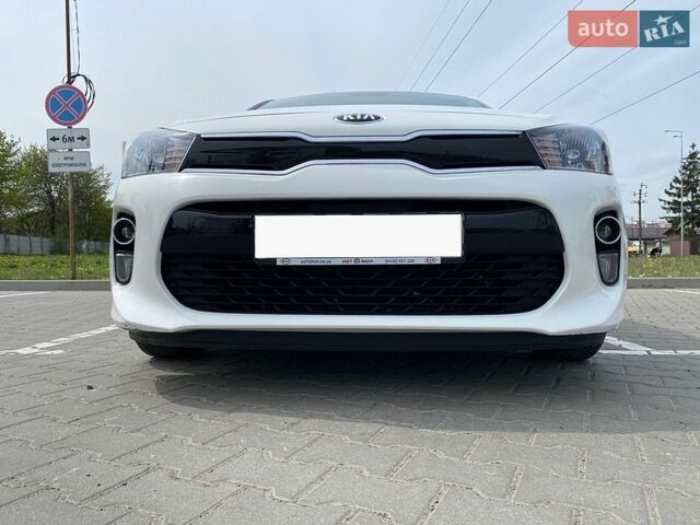 Білий Кіа Ріо, об'ємом двигуна 1.25 л та пробігом 72 тис. км за 11300 $, фото 5 на Automoto.ua