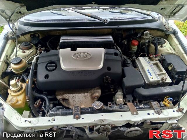 Белый Киа Рио, объемом двигателя 1.5 л и пробегом 300 тыс. км за 2800 $, фото 5 на Automoto.ua