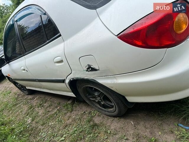 Білий Кіа Ріо, об'ємом двигуна 1.4 л та пробігом 300 тис. км за 1700 $, фото 3 на Automoto.ua