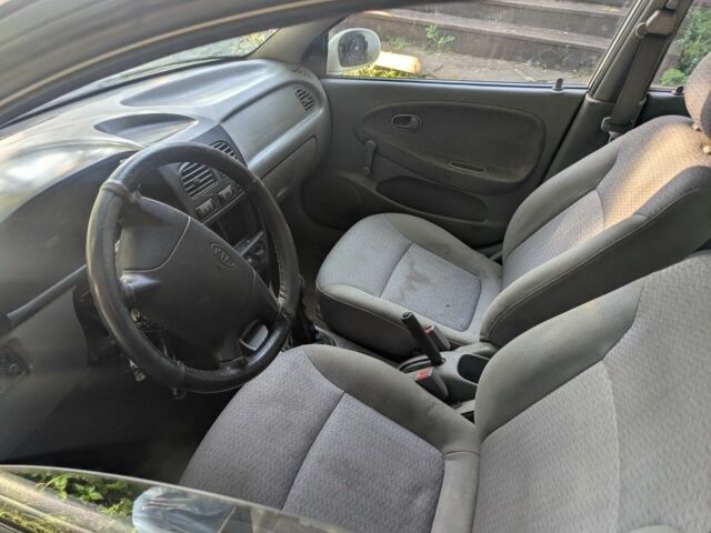 Белый Киа Рио, объемом двигателя 1.3 л и пробегом 354 тыс. км за 703 $, фото 2 на Automoto.ua