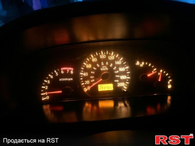 Белый Киа Рио, объемом двигателя 1.3 л и пробегом 290 тыс. км за 2400 $, фото 6 на Automoto.ua