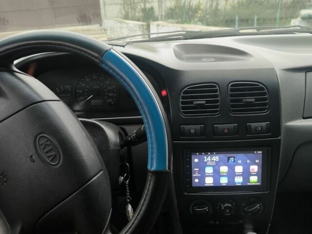 Білий Кіа Ріо, об'ємом двигуна 1.5 л та пробігом 300 тис. км за 3000 $, фото 4 на Automoto.ua