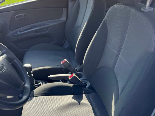 Белый Киа Рио, объемом двигателя 1.4 л и пробегом 91 тыс. км за 5633 $, фото 4 на Automoto.ua